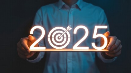 Business professional illuminates the year twenty twenty five target on a glowing platform held between both hands