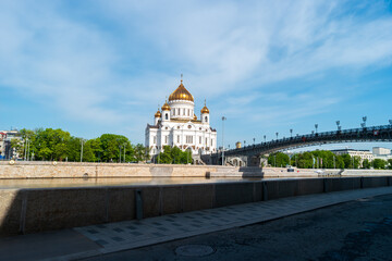 Moscow, Russia - May 16, 2025: Cathedral of Christ the Savior, or the Church of the Nativity of Christ. Patriarch's Bridge view from below. Bersenevskaya Embankment. Spring sunny morning