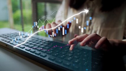 A business person engages with a laptop, utilizing data analysis tools and visual graphics to monitor financial trends and growth opportunities in a serene workspace. Copula - Powered by Adobe