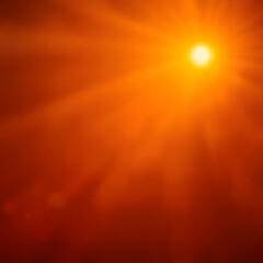 This image is an intense and vibrant abstract composition, dominated by a fiery orange and yellow color palette. A central, brilliant light source radiates outwards with strong beams, creating a power