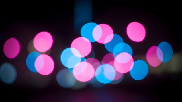 Abstract pink and blue bokeh lights background