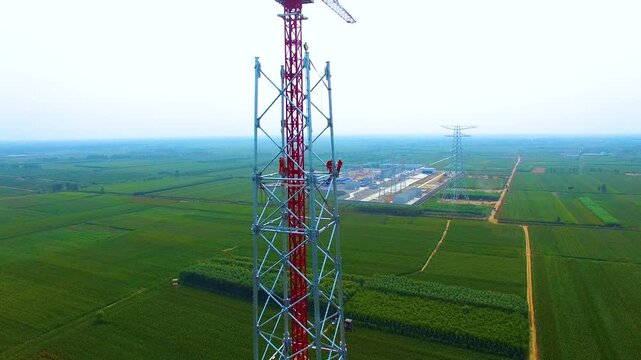 High Voltage Transmission Tower Construction Site Aerial View