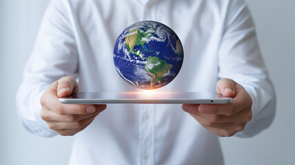 Empowering global connection, businessman holds tablet displaying Earth, symbolizing worldwide communication and technological advancement, modern business solutions