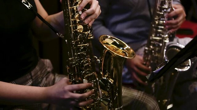 Close-Up of Musician Playing Alto Saxophone