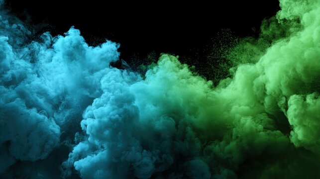 Bright blue and green smoke swirls dramatically rise against a black backdrop creating a vibrant and mystical scene. The motion of the smoke adds depth and intrigue.