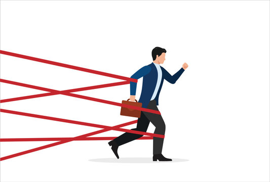 Business difficulty or struggle with career obstacle, limitation and trap or challenge to overcome to success concept, businessman tied up with red tape trying to run away with full effort.