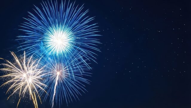 Vibrant Blue Fireworks Display Against a Dark Starry Night Sky
