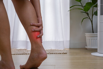 Acute ankle strain during walking—highlighting sudden calf pain. Fast, expert treatment restores mobility and prevents further injury. 