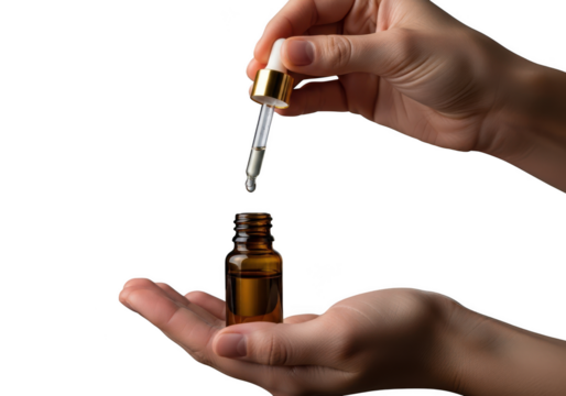 Hands dispensing essential oil drop into amber bottle, skincare serum concept isolated on transparent background