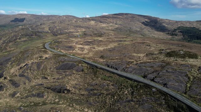 Drone Shot of Road in Caha Mountain on Sunny Day, Ireland, Pass and Landscape