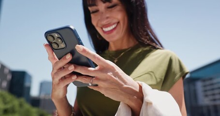 Phone, hands and businesswoman in city for communication, typing or email on mobile app. Technology, laughing and low angle of female corporate employee with cellphone for texting or social media. - Powered by Adobe