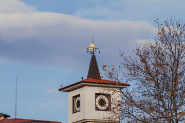Historic Clock Tower Against Clear Blue Sky Sunny Day