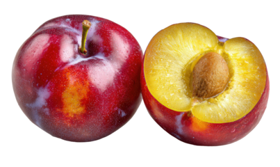 A whole and a halved red plum, showcasing its juicy yellow flesh