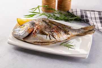Baked dorada fish with spices