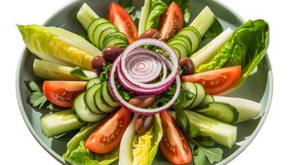 Fresh salad with tomatoes cucumbers olives and red onion on a light plate on transparent background