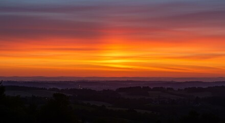 Obraz premium Vibrant Sunrise Over Rural Landscape