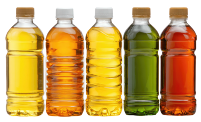 Five plastic bottles containing colorful beverages