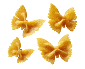 Four golden bow-tie shaped pasta pieces on a black background