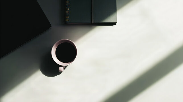 utilitarian. A clean, minimalist office desk from a top-down view with soft natural lighting. real-estate listings.