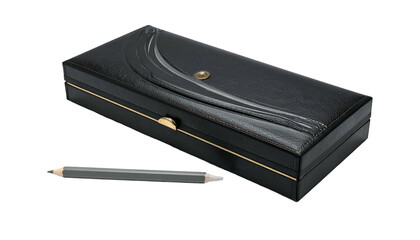 Black leather box with gold accents, pencil and clasp on a black background, studio shot
