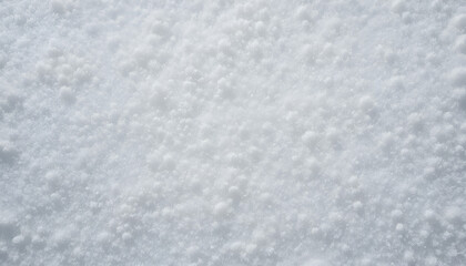 Fresh winter snow glistens, creating an icy wonderland with delicate crystalline flakes, perfect for holiday cards, winter promotions, and seasonal designs