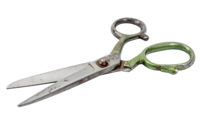 Close-up of open, slightly rusty tool with green handles, used for cutting