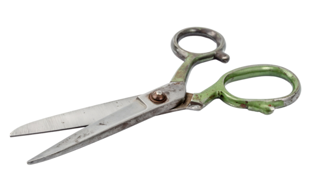 Close-up of open, slightly rusty tool with green handles, used for cutting