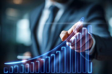 Businessman hand pointing at a futuristic digital interface with a bar chart showing financial growth, stock market success, and business progress.