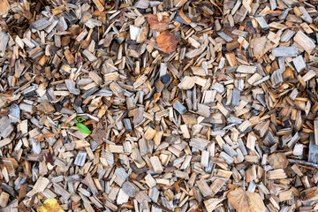Natural wood chips material for playground. Nature background.