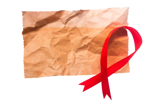 aids awareness ribbon with blank old crumpled paper isolated on white