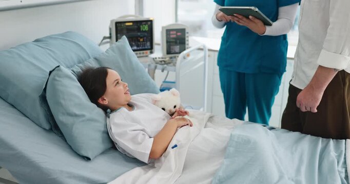 Medical, results and child in hospital bed with thumbs up, doctor checkup or positive news in recovery. Healthcare, parent or girl in clinic with tech, examination or good feedback in surgery report.