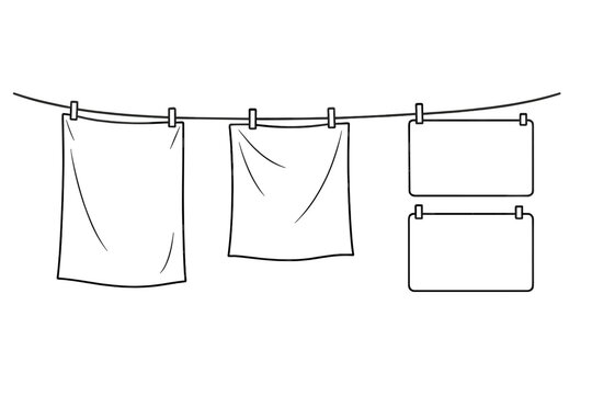 Clothesline with hanging laundry and blank rectangular signs secured by clothespins