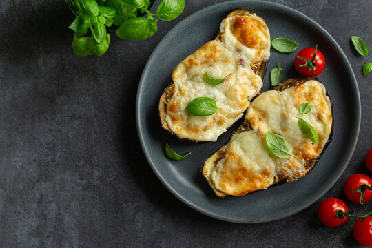 cheesy stuffed eggplant parmigiana sith tomato sauce