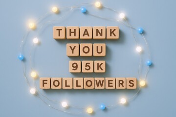Thank you message with decorative lights for social media milestone achievement, celebration and gratitude concept