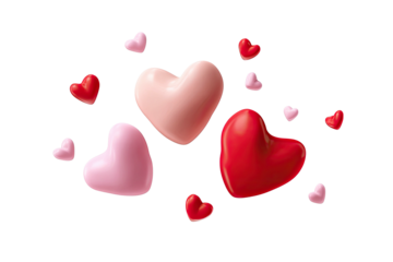 A scattering of red and pink glossy hearts on a black background