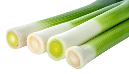 Four stalks of a green and white vegetable with a sliced end against a dark background