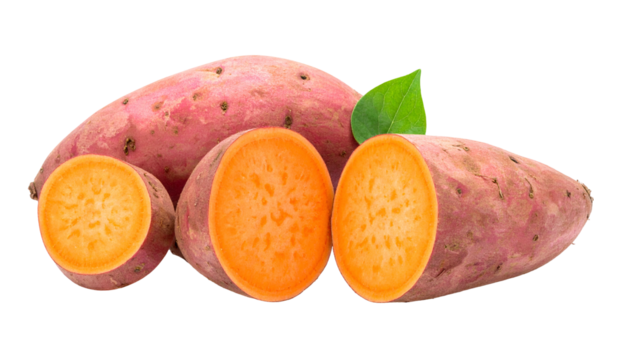 Close-up studio shot of several whole and halved sweet potatoes with green leaf
