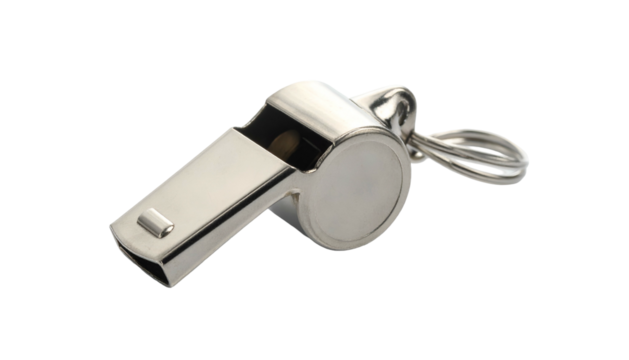 Close-up studio shot of a shiny, metallic whistle against a stark black background