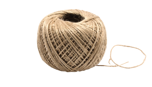 A close-up shot of a ball of natural twine on a black background