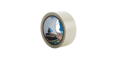 A roll of tan masking tape, partially unrolled, with an image visible inside its core