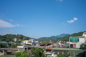 Rooftop View of City and Mountain Landscape in Ha Giang, Vietnam