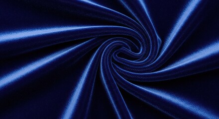 Abstract swirling vortex of bright blue light streaks against a dark background creating a sense of motion and depth