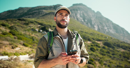 Outdoor, hiking and man with cellphone, thinking and journey with digital app for navigation. Healthy person, travel or hiker with smartphone, location and direction with adventure and contemplation