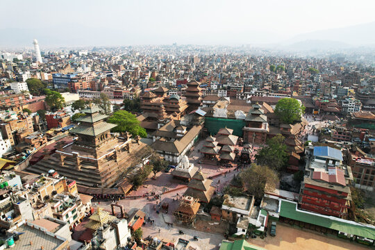 Kathmandu Durbar Square in Basantapur, Nepal, showcases historic palaces, temples, and courtyards. The vibrant square reflects rich architecture, culture, and centuries of Newar heritage.