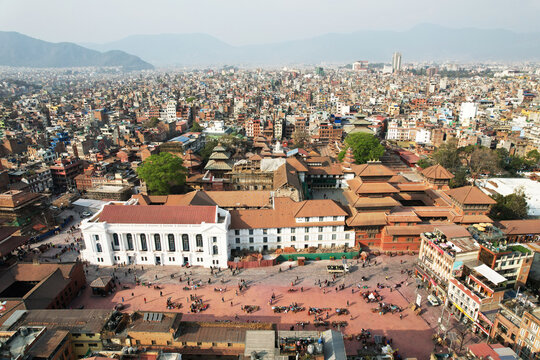 Kathmandu Durbar Square in Basantapur, Nepal, showcases historic palaces, temples, and courtyards. The vibrant square reflects rich architecture, culture, and centuries of Newar heritage.