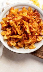 Crunchy fried pasta chips with dips.