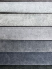Fabric swatches in different colors, upholstery material for furniture. Samples of fabrics