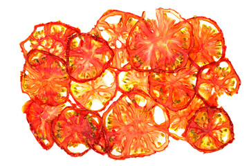 Thin slices of ripe tomato on a white background