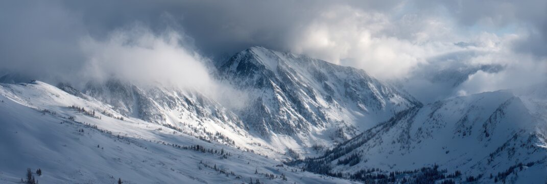 Snow covered mountain range with dramatic clouds and sunlight winter landscape - Powered by Adobe