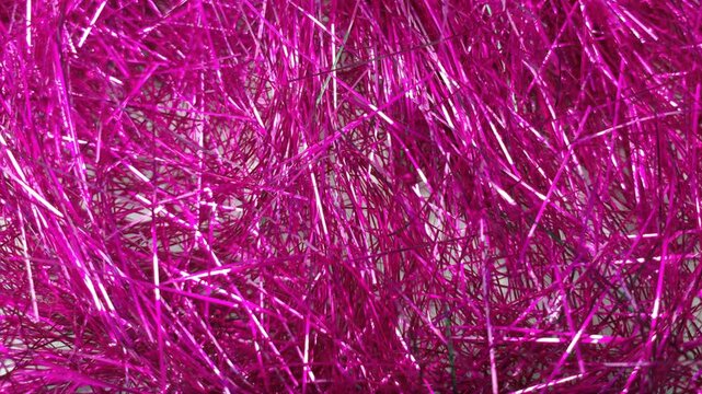 Stop motion Pink foil tinsel background, Shimmer shiny pink tinsel shred festive, wedding, birthday party, Christmas decorations